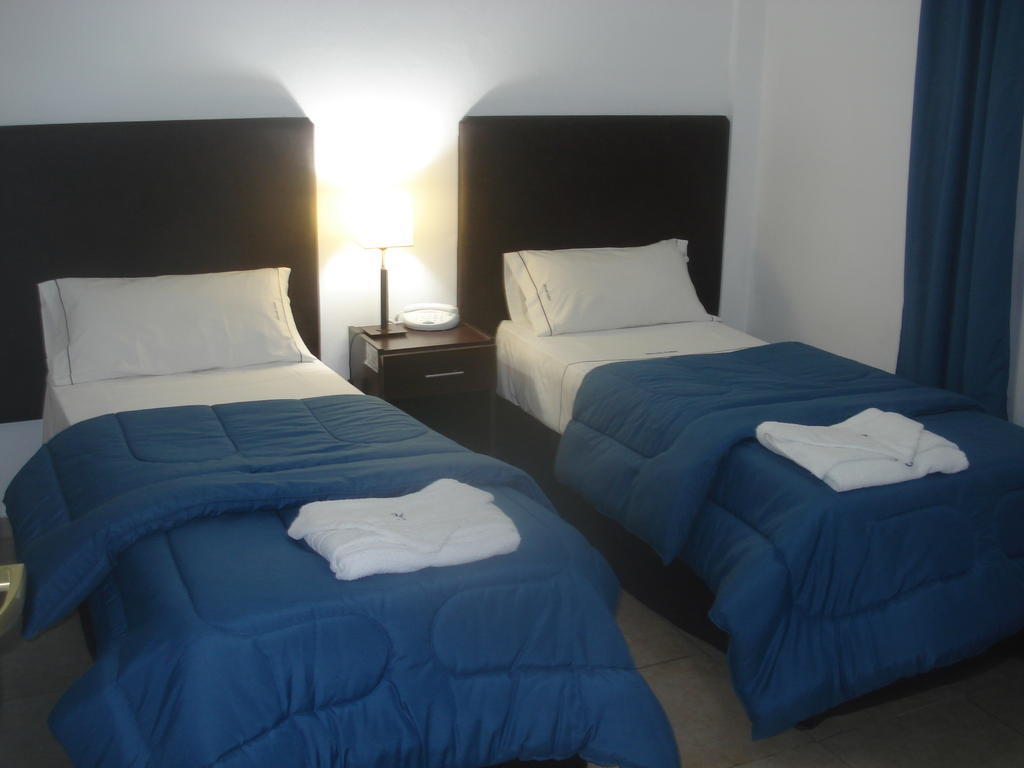 Morada Suites Кампана Номер фото